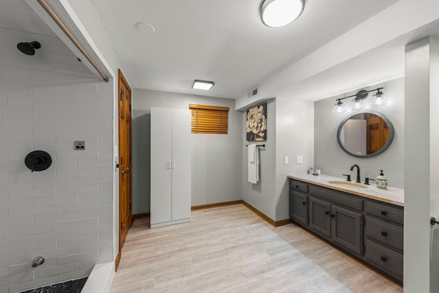 1310 Yorkshire Woods Ct, Wheaton, IL 60189 - full bath featuring vanity, tiled shower, and wood finished floors