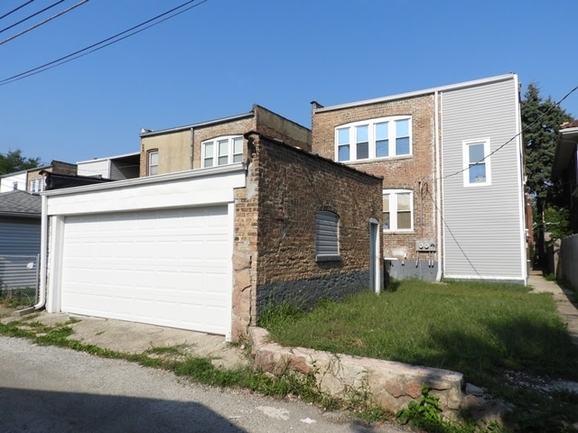 exterior space featuring a garage