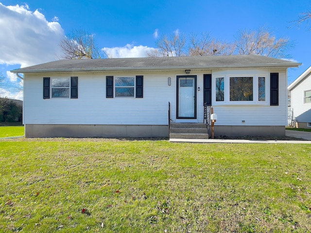 view of front facade with a front lawn