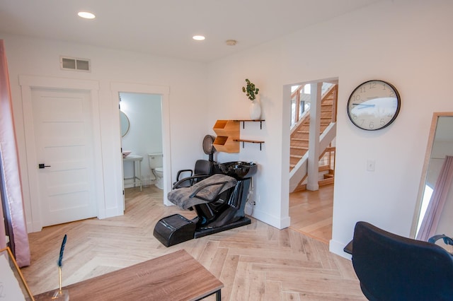 hallway featuring light parquet floors