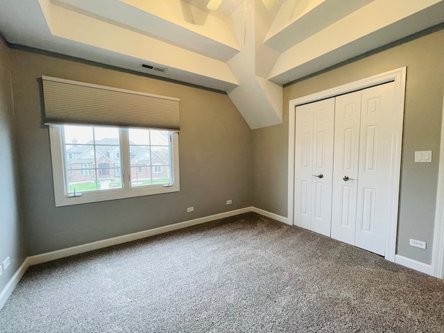 unfurnished bedroom featuring a closet and carpet