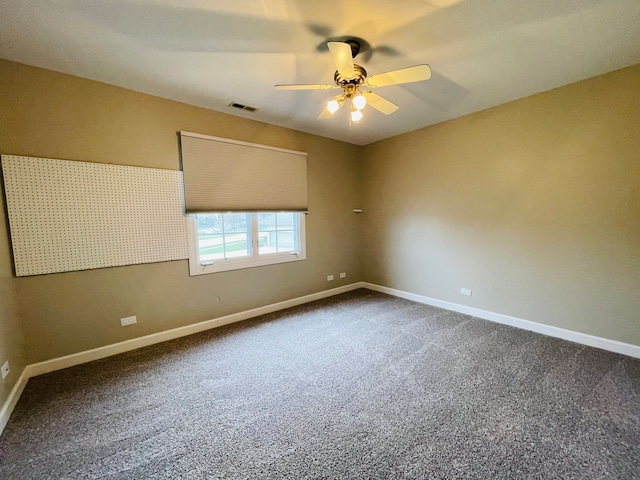 unfurnished room with carpet flooring and ceiling fan