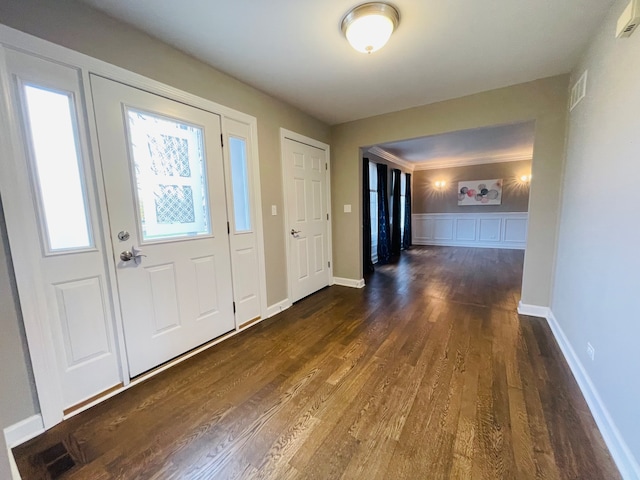 foyer featuring dark hardwood / wood-style floors