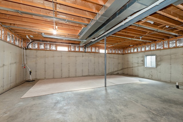 basement featuring plenty of natural light