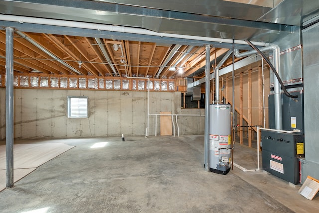 basement featuring gas water heater