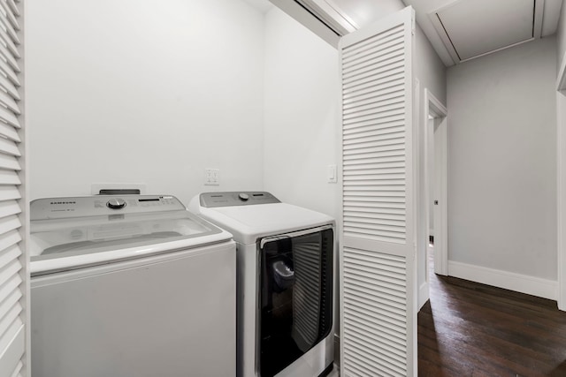 washroom featuring dark hardwood / wood-style floors and independent washer and dryer