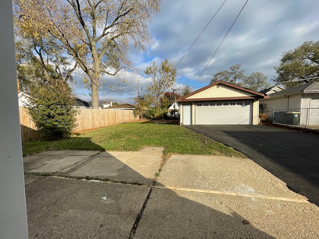 view of yard featuring a garage