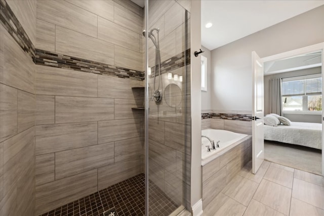 bathroom featuring shower with separate bathtub and tile patterned floors