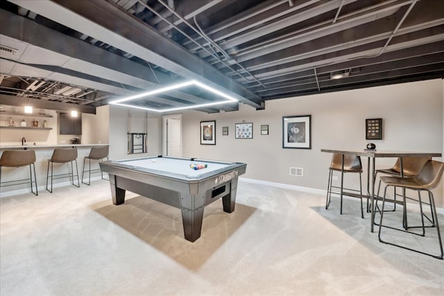 recreation room with bar area, light carpet, and billiards