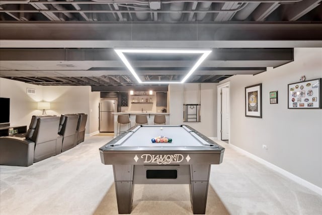 rec room featuring bar area, light carpet, and pool table