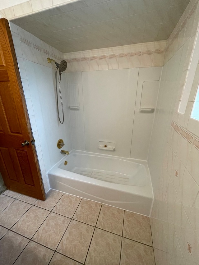 bathroom with  shower combination and tile patterned floors