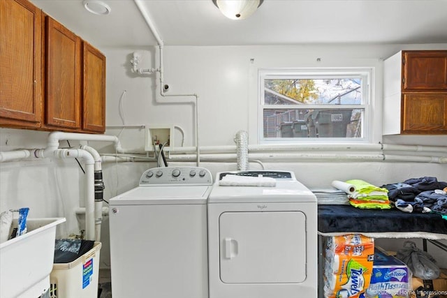 15323 Cherry Ln, Markham, IL 60428 - laundry room with cabinet space and separate washer and dryer