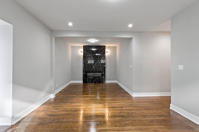 entrance foyer with dark hardwood / wood-style floors