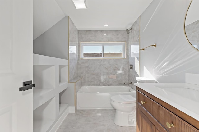 full bathroom featuring vanity, toilet, and tiled shower / bath