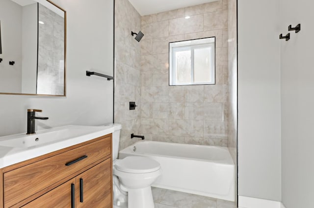 full bathroom featuring tile patterned flooring, vanity, toilet, and tiled shower / bath combo