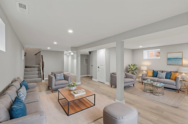 living room with light hardwood / wood-style flooring