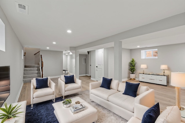 living room with light hardwood / wood-style floors