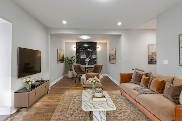 living room with light hardwood / wood-style floors