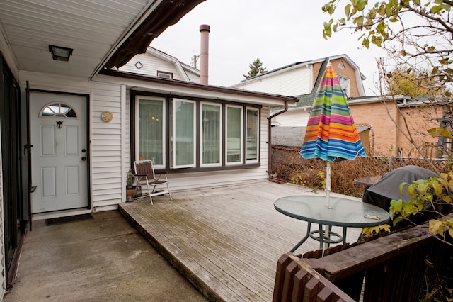 exterior space featuring a grill and a deck