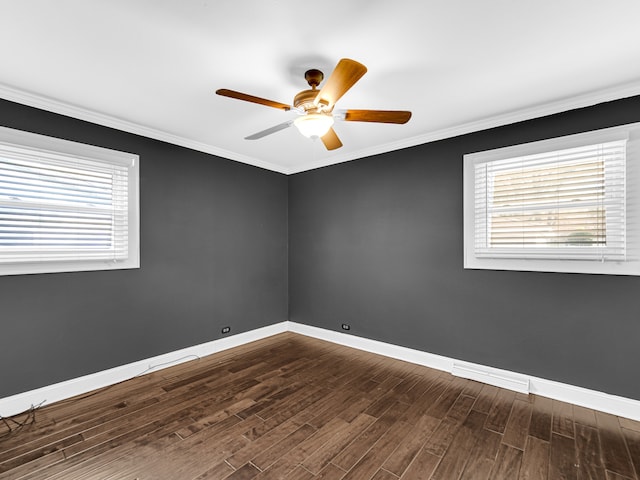 spare room with hardwood / wood-style flooring, ceiling fan, and crown molding