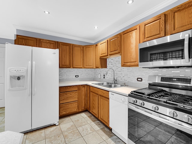 kitchen with crown molding, sink, appliances with stainless steel finishes, tasteful backsplash, and light tile patterned flooring