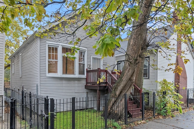 view of front of house with a balcony