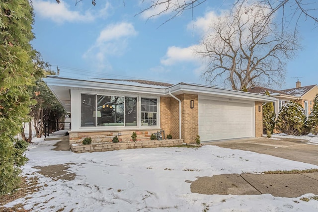 single story home featuring a garage