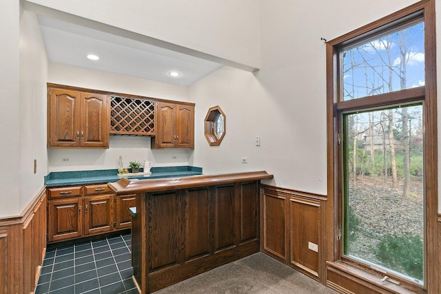 kitchen with dark tile patterned flooring