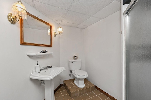 bathroom with tile patterned flooring and toilet