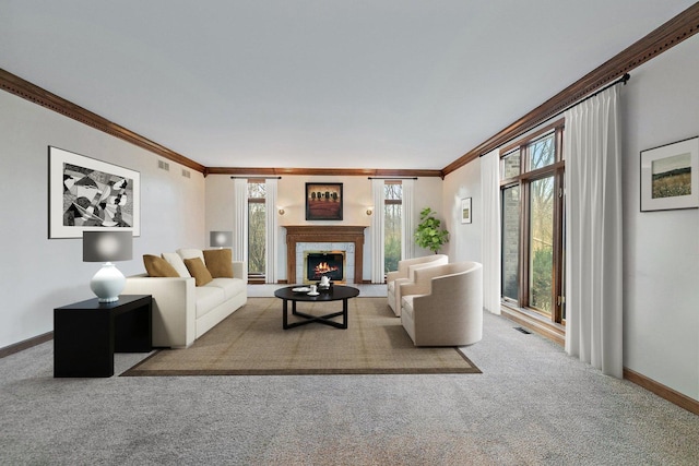 living room with a healthy amount of sunlight, light colored carpet, and ornamental molding