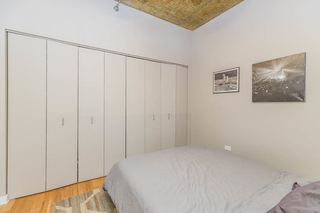 bedroom with light hardwood / wood-style floors