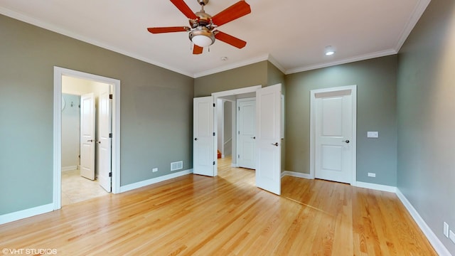 unfurnished bedroom with light wood-type flooring, ceiling fan, and ornamental molding