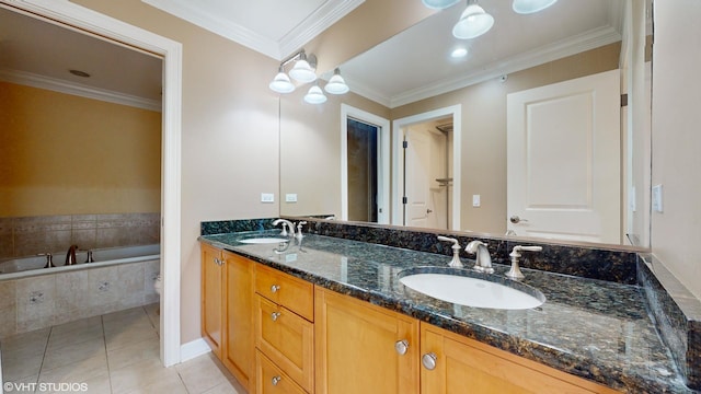 bathroom with tile patterned floors, vanity, crown molding, a relaxing tiled tub, and toilet