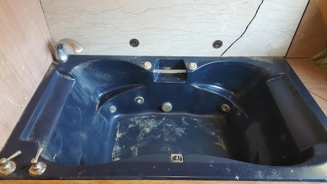 interior details featuring a sink