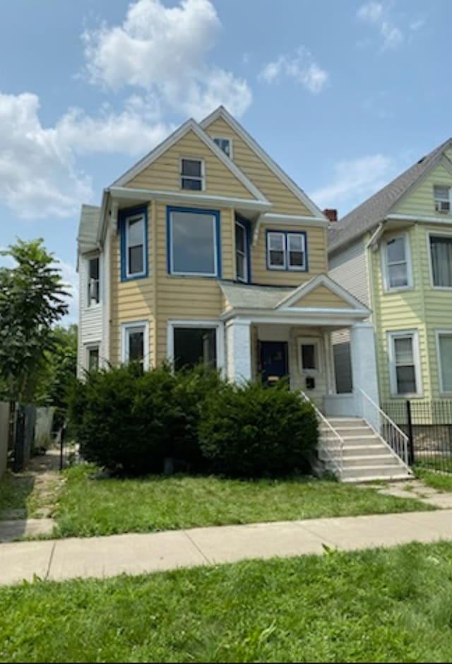 view of front of home with a front yard