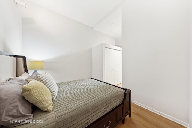 bedroom with light hardwood / wood-style flooring