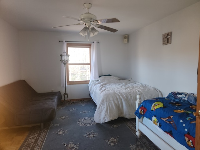 bedroom featuring ceiling fan