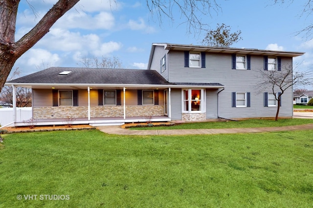 view of front of property featuring a porch and a front yard