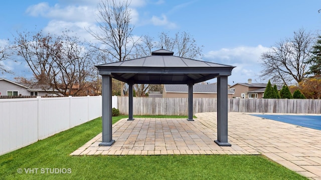 view of patio / terrace with a gazebo and a covered pool