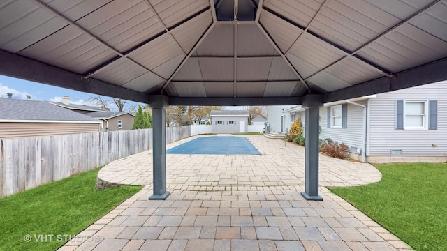 view of pool with a gazebo, a patio area, and an outdoor structure