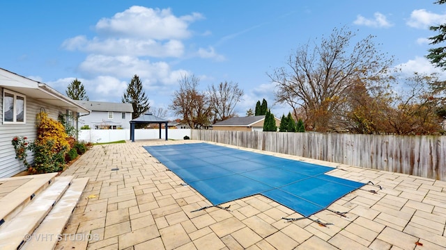 view of pool featuring a gazebo and a patio area