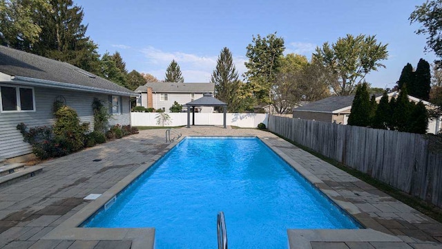 view of pool featuring a gazebo and a patio