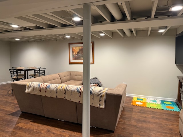 living room with dark hardwood / wood-style flooring