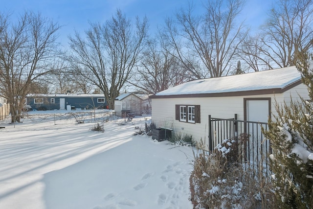 view of yard covered in snow