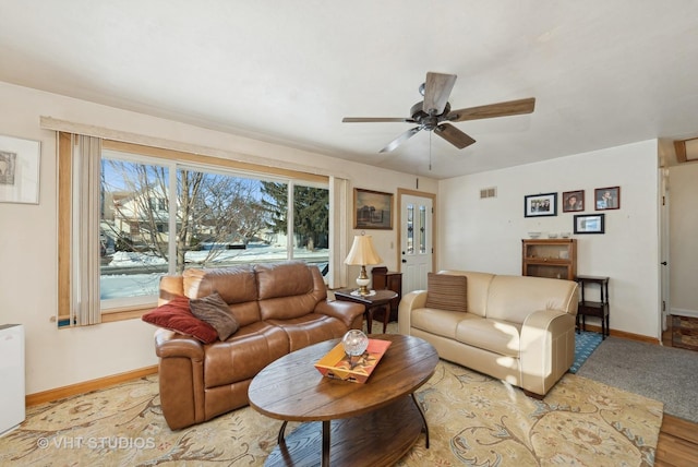 living room featuring ceiling fan