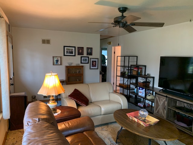 living room featuring ceiling fan