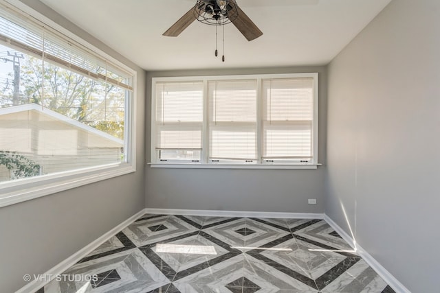 empty room with ceiling fan