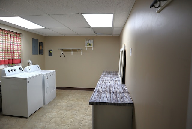 washroom featuring washer and dryer and electric panel