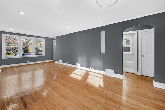 empty room with light hardwood / wood-style floors