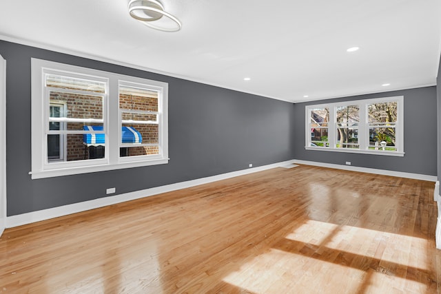 unfurnished room featuring light wood-type flooring